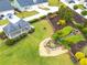 Aerial view of a gazebo and pond surrounded by meticulously landscaped grounds at 6330 Garden Cir, Douglasville, GA 30135