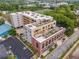 An aerial view showcases the building's architecture, surrounding landscape, and convenient parking areas at 112 Rogers Ne St # 304, Atlanta, GA 30317