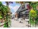 Charming outdoor dining space with floral decor, offering a delightful and inviting atmosphere for customers at 112 Rogers Ne St # 304, Atlanta, GA 30317