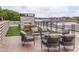 Comfortable rooftop terrace featuring cozy seating around an outdoor fireplace, perfect for entertaining and relaxing at 112 Rogers Ne St # 304, Atlanta, GA 30317