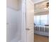 Bathroom featuring a shower and convenient access to the main bedroom at 240 Orchard Dr, Covington, GA 30014