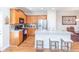 Well-equipped kitchen featuring stainless steel appliances, granite countertops, and wooden cabinetry at 240 Orchard Dr, Covington, GA 30014