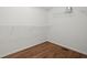 Walk-in closet with hardwood floors and wire shelving at 3950 Chattahoochee Rd, Cumming, GA 30041