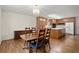 Bright kitchen featuring wood cabinets, stainless steel appliances, and a center island at 3950 Chattahoochee Rd, Cumming, GA 30041