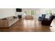 Spacious living room features hardwood floors, a fireplace, and an abundance of natural light at 3950 Chattahoochee Rd, Cumming, GA 30041
