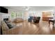 The living room features hardwood floors and a fireplace, perfect for relaxing or entertaining at 3950 Chattahoochee Rd, Cumming, GA 30041