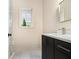 Bathroom featuring sleek vanity with modern fixtures and shower at 4757 Lake Forrest Drive Northwest Dr, Atlanta, GA 30342