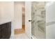 Modern bathroom featuring a glass-enclosed shower with decorative tile work and stylish fixtures at 4757 Lake Forrest Drive Northwest Dr, Atlanta, GA 30342