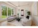 Inviting living room with large windows, stylish sofas, and modern decor at 4757 Lake Forrest Drive Northwest Dr, Atlanta, GA 30342