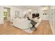 Bright living room with fireplace, built-ins, and contemporary decor, with hardwood floors and light walls at 4757 Lake Forrest Drive Northwest Dr, Atlanta, GA 30342