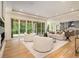 Spacious living room with sliding glass doors, and an open kitchen area, great for entertaining at 4757 Lake Forrest Drive Northwest Dr, Atlanta, GA 30342