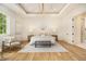 Bright and spacious main bedroom with large windows, hardwood floors, tray ceiling and designer lighting at 4757 Lake Forrest Drive Northwest Dr, Atlanta, GA 30342