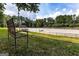 The equestrian park with horse riding area and a bench surrounded by greenery at 4757 Lake Forrest Nw Dr, Atlanta, GA 30342