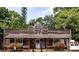 The historic Westville town replica with western architecture and lush greenery at 4757 Lake Forrest Nw Dr, Atlanta, GA 30342