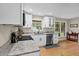 Modern kitchen features granite countertops, stainless steel appliances, and natural light at 4774 Saint Bernard Sw Dr, Lilburn, GA 30047