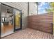 Back deck with wood privacy fence offering seamless indoor-outdoor living from kitchen and dining area at 2333 Mason Dr # D26, Atlanta, GA 30316