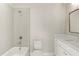 Bathroom with tiled shower, toilet and vanity with drawers and sink at 2333 Mason Dr # D26, Atlanta, GA 30316