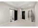 Neutral bedroom with en suite bathroom featuring a barn door entry at 2333 Mason Dr # D26, Atlanta, GA 30316