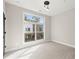 Spacious bedroom with large window and plush carpeting at 2333 Mason Dr # D26, Atlanta, GA 30316