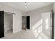 Bright bedroom with carpeting and multiple doorways at 2333 Mason Dr # D26, Atlanta, GA 30316