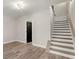View of staircase with wood steps and wood railing at 2333 Mason Dr # D26, Atlanta, GA 30316