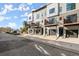 View of modern townhome exteriors with private garages, front doors, and deck areas at 2333 Mason Dr # D26, Atlanta, GA 30316