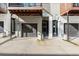 View of modern townhome garages and front door entrances at 2333 Mason Dr # D26, Atlanta, GA 30316
