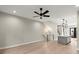 Spacious living room featuring hardwood floors, recessed lighting, and staircase to upper level at 2333 Mason Dr # D26, Atlanta, GA 30316