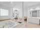 Bathroom with a fireplace, jacuzzi, and a sitting area at 310 Ivy Brooke Ct, Atlanta, GA 30342