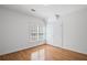 Bedroom features light gray walls, hardwood floors, and a closet at 310 Ivy Brooke Ct, Atlanta, GA 30342