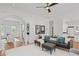 Bright living room with an open layout, connecting to the kitchen, and featuring stylish modern furniture at 310 Ivy Brooke Ct, Atlanta, GA 30342