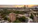 Stunning aerial view capturing a luxury condominium nestled among lush trees and a vibrant cityscape at 3180 Mathieson Ne Dr # 1401, Atlanta, GA 30305