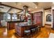 Gourmet kitchen boasts custom cabinets, granite counters, stainless appliances and island seating at 3180 Mathieson Ne Dr # 1401, Atlanta, GA 30305
