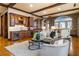 Elegant living area with brick accents, a bar area, and cozy furniture at 3180 Mathieson Ne Dr # 1401, Atlanta, GA 30305