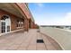 Expansive outdoor patio with brick accents, arched openings, and views of the cityscape at 3180 Mathieson Ne Dr # 1401, Atlanta, GA 30305