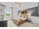 Comfortable bedroom featuring a well-made bed and decorated with tasteful accents at 352 Foxglove Way, Mcdonough, GA 30253