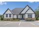 Attractive exterior elevation showcasing the building's architectural details and landscaping at 352 Foxglove Way, Mcdonough, GA 30253