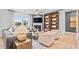 Cozy living room with fireplace, built-in bookshelves, and stylish furniture at 352 Foxglove Way, Mcdonough, GA 30253