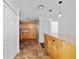 Bright kitchen featuring a large island with granite countertops and stainless steel appliances at 4946 Lake Ridge Trail, Lilburn, GA 30047