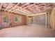 Unfinished basement with exposed insulation and framing, ready for customization at 530 Old Cobblestone Dr, Atlanta, GA 30350
