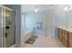 Bathroom featuring tiled floor, a shower, and soaking tub at 829 Castlebottom Dr, Lawrenceville, GA 30045