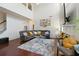 Bright and airy living room with hardwood floors, a fireplace, and comfortable seating area at 829 Castlebottom Dr, Lawrenceville, GA 30045