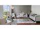 Cozy living room with comfortable seating, hardwood floors, and a bright, airy atmosphere at 829 Castlebottom Dr, Lawrenceville, GA 30045
