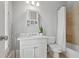 Cozy bathroom featuring a sink, toilet, shower, and neutral colors at 1070 Standard Ne Dr, Brookhaven, GA 30319