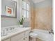 Bathroom featuring a tile tub, shower, and white cabinets at 1070 Standard Ne Dr, Brookhaven, GA 30319