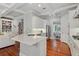 Spacious kitchen featuring modern appliances, granite countertops, and an adjacent living area at 1070 Standard Ne Dr, Brookhaven, GA 30319