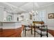 View of a kitchen with a dining area and island with marble countertops at 1070 Standard Ne Dr, Brookhaven, GA 30319