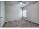 Neutral bedroom with carpet, ceiling fan, and a window providing natural light at 158 Bryon Ln, Acworth, GA 30102