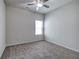 Neutral carpeted bedroom with a window bringing in lots of natural light at 158 Bryon Ln, Acworth, GA 30102