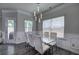 Dining room with modern light fixture and lots of light at 158 Bryon Ln, Acworth, GA 30102